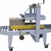 máquina para selar caixas